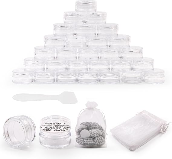 SumDirect 100Pcs 5Gram Clear Empty Cosmetic Containers Jars Sample Pots Bottles, Travel Pots for Cream, Lotion, Lip Balm with Mini Spatula and 10Pcs White Sheer Organza Bags