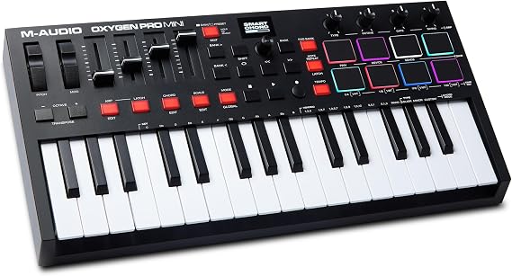 M-AUDIO Oxygen Pro Mini 32 USB MIDI Keyboard Controller 32 touch-sensitive mini buttons 8 pads 4 controls 4 faders and DAW software included