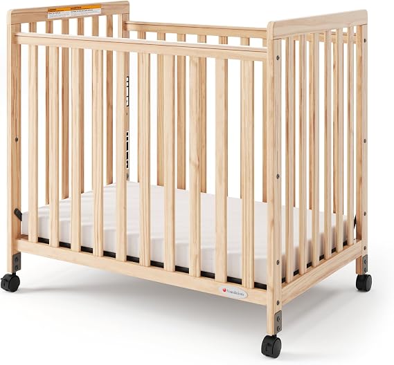Foundations SafetyCraft Compact Slatted Daycare Crib, Natural | Durable Wood Construction, 4 Non-Marking Casters (2 Locking), Includes 3" InfaPure Foam Mattress