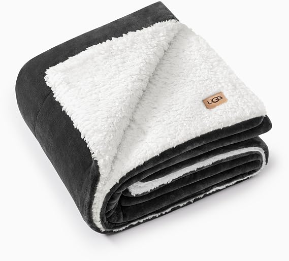UGG Nita Throw Blanket, Reversible Fleece Blanket, 50" x 70", Charcoal Grey | Plush UGG Fluff to Smooth Box Stitched Fleece, Machine Washable, Soft & Cozy for Couch or Bed, College Dorm Room Essential